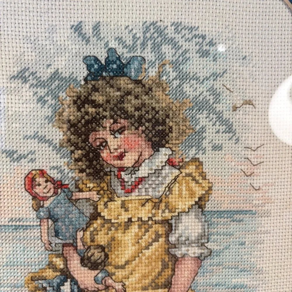 Handmaid Seaside Framed 21x14”Cross Stitch Girl w/ Dolls Beach Scene Vintage